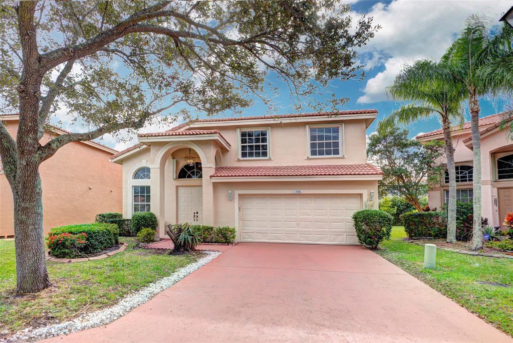 Photo of 11526 NW 5th Street, Coral Springs, FL 33071 (MLS # B26029096)