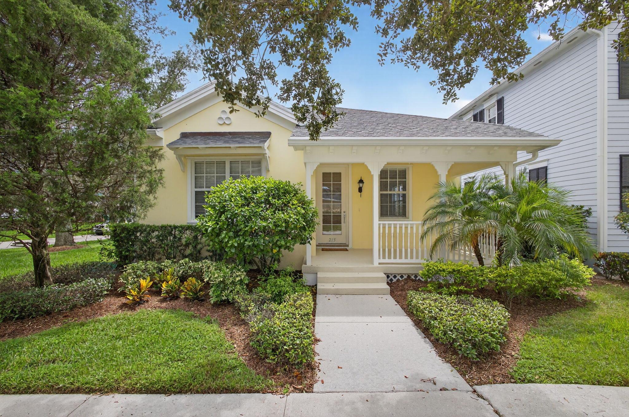Completely Renovated Home in New Haven at AbacoaThis beautifully updated 2-bedroom, 2-bath, single-story home with a 2-car garage is perfectly located on a charming corner lot in Jupiter's sought-after New Haven at Abacoa. High ceilings, an open and spacious floor plan, and abundant natural light create an inviting flow throughout. Enjoy coffee on the front porch or relax on the screened back patio overlooking lush oak-lined streets.The full renovation includes a stunning kitchen with floor-to-ceiling cabinetry, quartz countertops, stainless appliances, a new peninsula with seating, coffee bar, and pendant lighting. Both baths are fully remodeled with designer tile, quartz vanities, a frameless glass shower, and a soaking tub. The primary suite offers a luxurious retreat with a