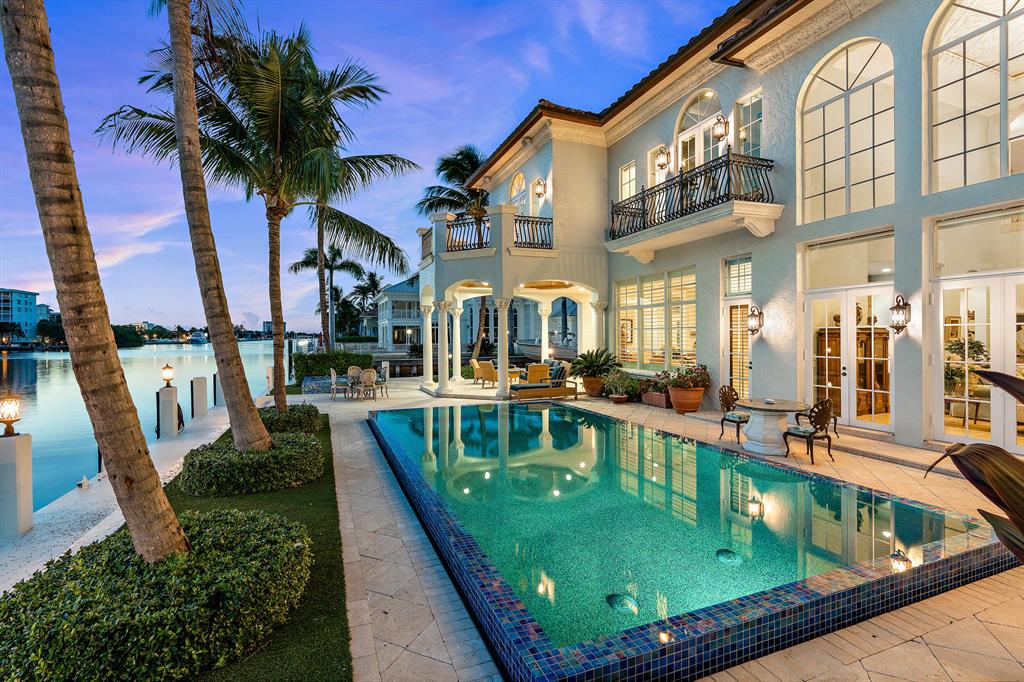 THIS IS IT! If you have been looking for the PERFECT WATERFRONT home where you can keep not just one, but TWO 100+ foot yachts directly on the Intracoastal and in walking distance to the beach - this EXQUISITE estate has everything you have been searching for and more! Situated at the end of a cul-de-sac on a premium point lot, this STUNNING home is the definition of South Florida luxury living and is ready for you to make your own. Boasting luxurious outdoor space, including a sparkling heated salt-water pool and spa, summer kitchen, and waterfront that wraps around the property with views from every vantage point of the home, this property embodies the elegantly casual Delray Beach lifestyle. RENOVATED master suite, home theater, IMPACT windows, generator and so much more! {continue on