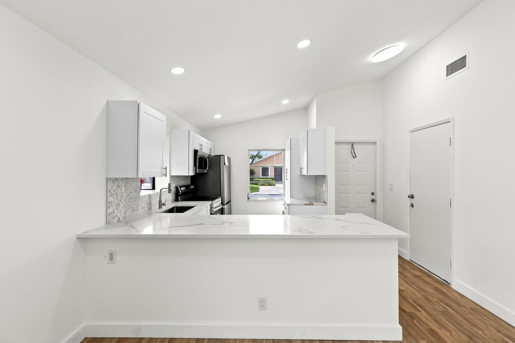 Photo of 8089 Springtree Road, Boca Raton, FL 33496 (MLS # B26015338)