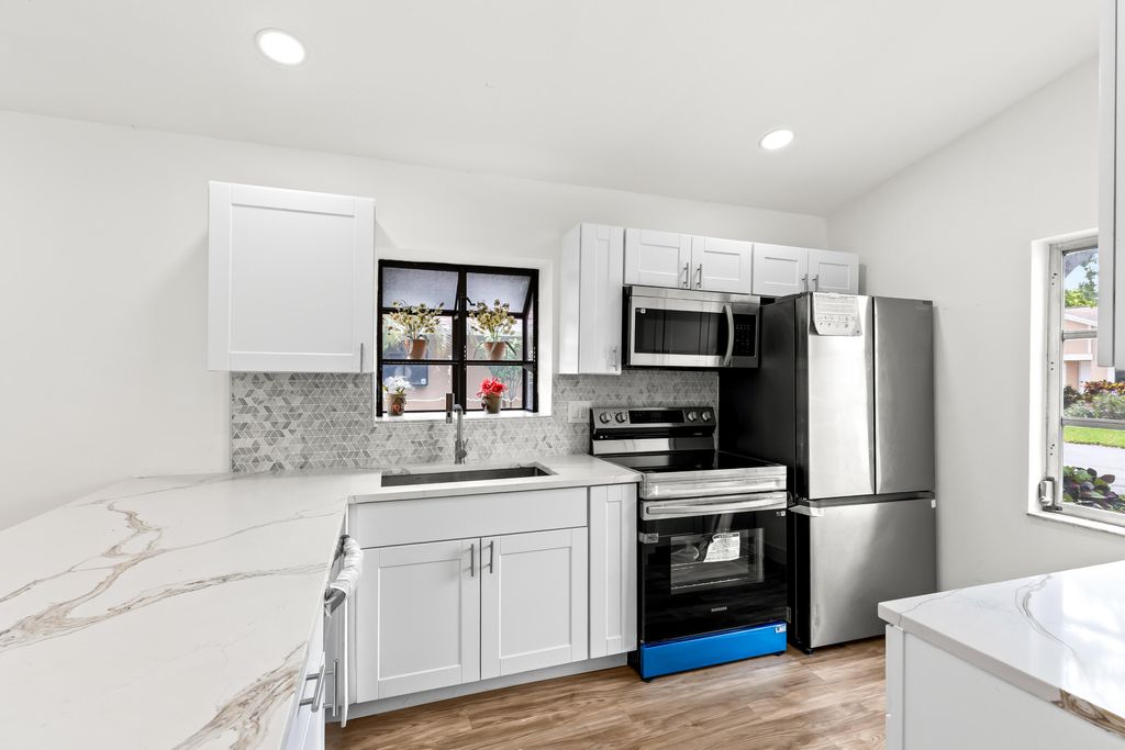 Photo of 8089 Springtree Road, Boca Raton, FL 33496 (MLS # B26015338)