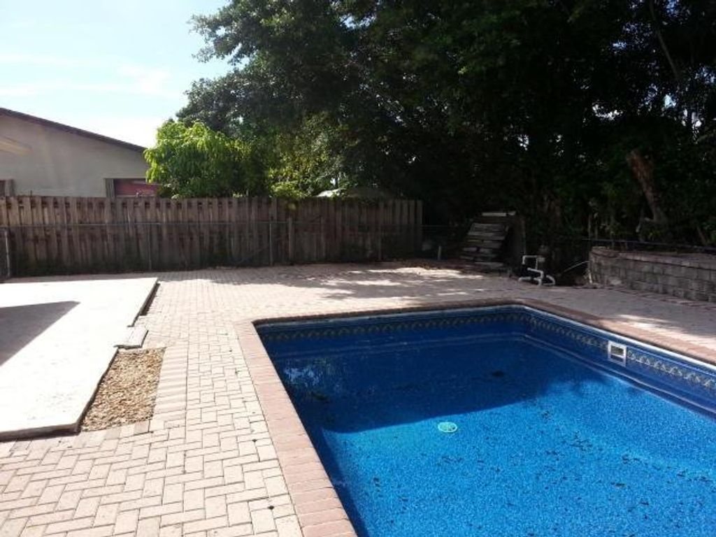 Photo of 9715 Sandalfoot Boulevard, Boca Raton, FL 33428 (MLS # F10480531)