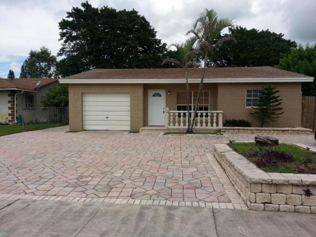 Photo of 9715 Sandalfoot Boulevard, Boca Raton, FL 33428 (MLS # F10480531)