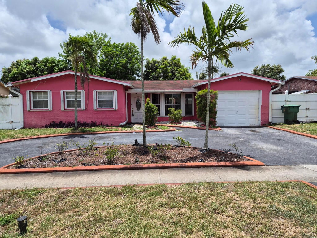 Photo of 4960 NW 16th Street, Lauderhill, FL 33313 (MLS # B26043105)