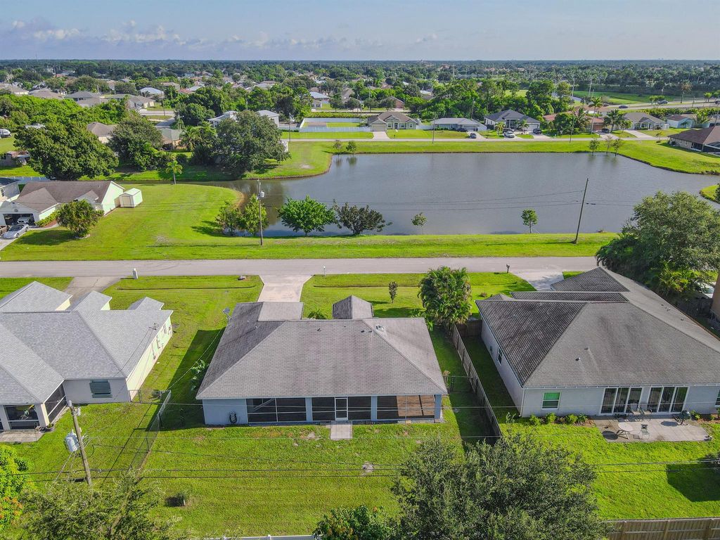 Photo of 564 SW Backert Avenue, Port Saint Lucie, FL 34953 (MLS # R11012552)