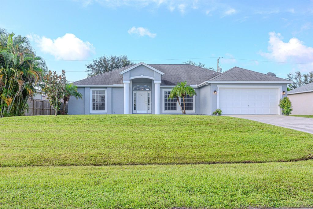 Photo of 564 SW Backert Avenue, Port Saint Lucie, FL 34953 (MLS # R11012552)