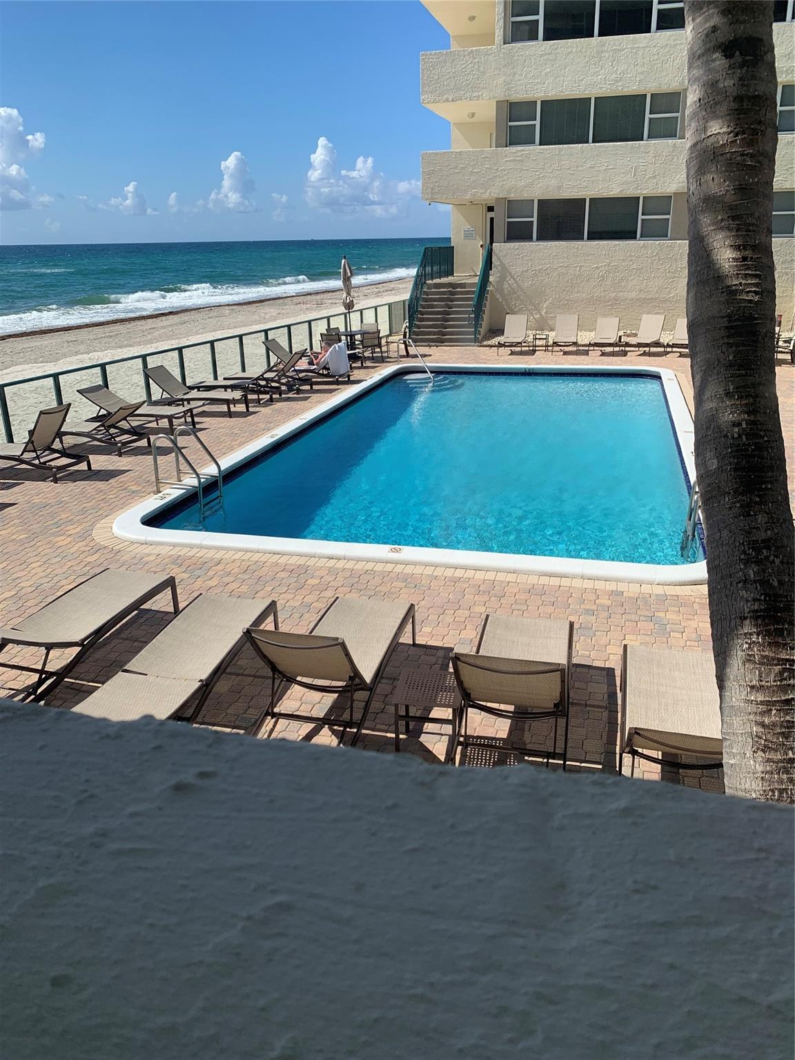 Nicely renovated 2/2 split plan apartment in prestigious Hillsboro Beach. Sit on your patio with views of ocean. Private beach, walking distance to shopping, restaurants and acclaimed Deerfield Beach Mile Walk. Community is family friendly, with 2 heated pools, social rooms, saunas in each building, rest rooms for convenience on first floor when at pool or beach.