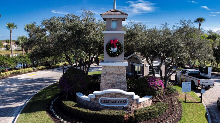 This exceptional home in Heritage Oaks pairs modern construction with extensive upgrades, highlighted by a truly custom resort-style pool and spa. Designed as the centerpiece of the property the enclosed pool features a raised deck with eight cascading waterfalls, finished in Chicago-style brick and overlooking a peaceful lake, creating a striking outdoor retreat ideal for both relaxation and entertaining. The custom outdoor summer kitchen is equally impressive, offering granite countertops, a refrigerator, side burner, and commercial-quality BBQ grill. Inside the home showcases tile and marble flooring, granite countertops in the kitchen and front bath, and lighted plant shelves. With numerous enhancements and priced below the cost of duplication, this home presents an great opportunity.