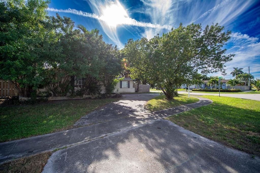 Photo of 9370 NW 25th Court, Sunrise, FL 33322 (MLS # F10538070)