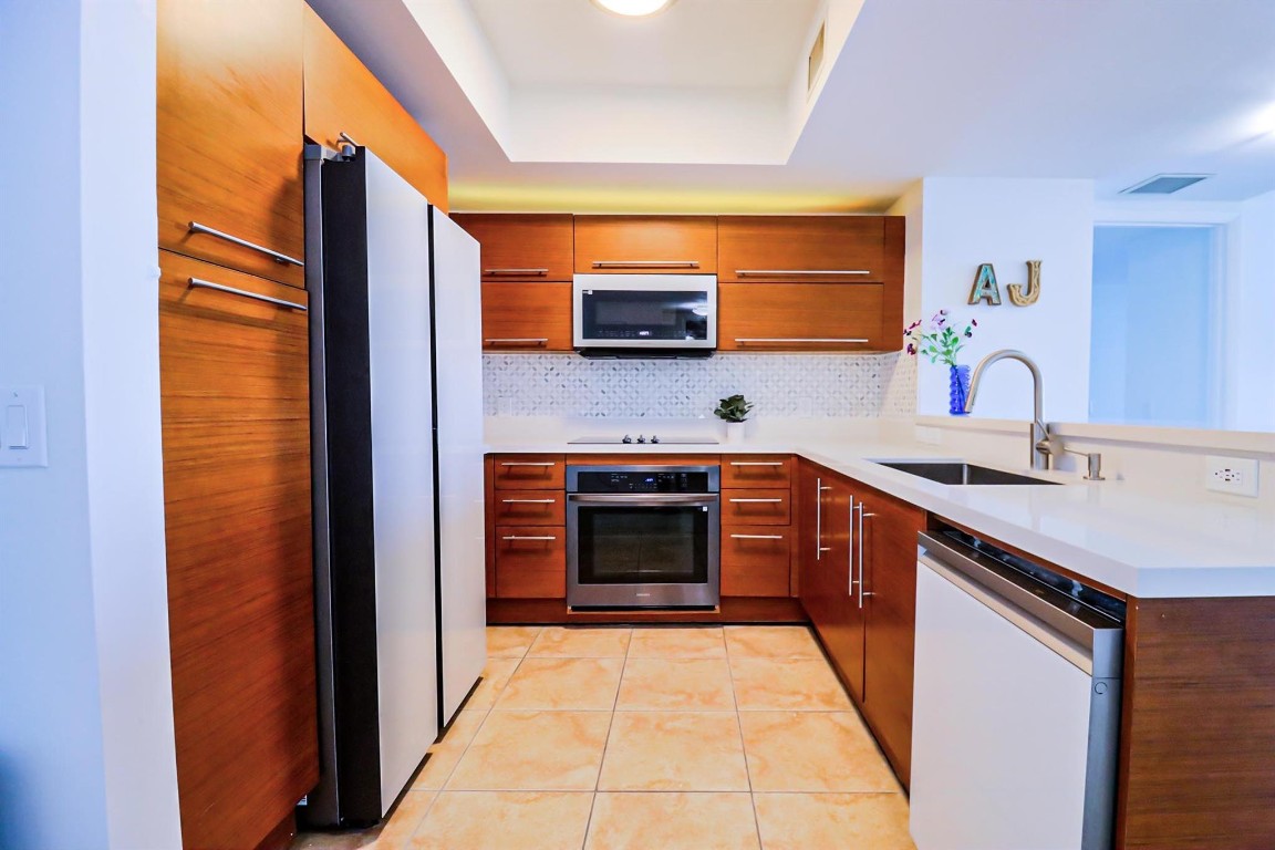 TAO SAWGRASS CONDOMINIUM - Residential