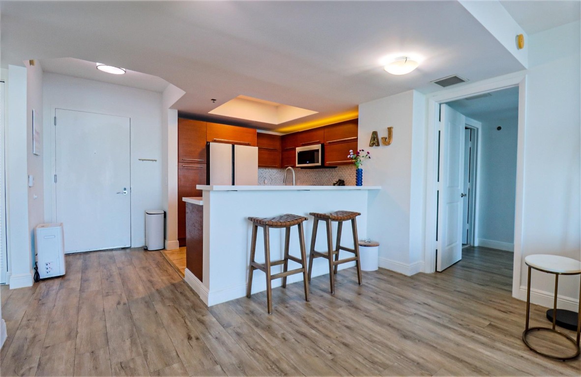 TAO SAWGRASS CONDOMINIUM - Residential