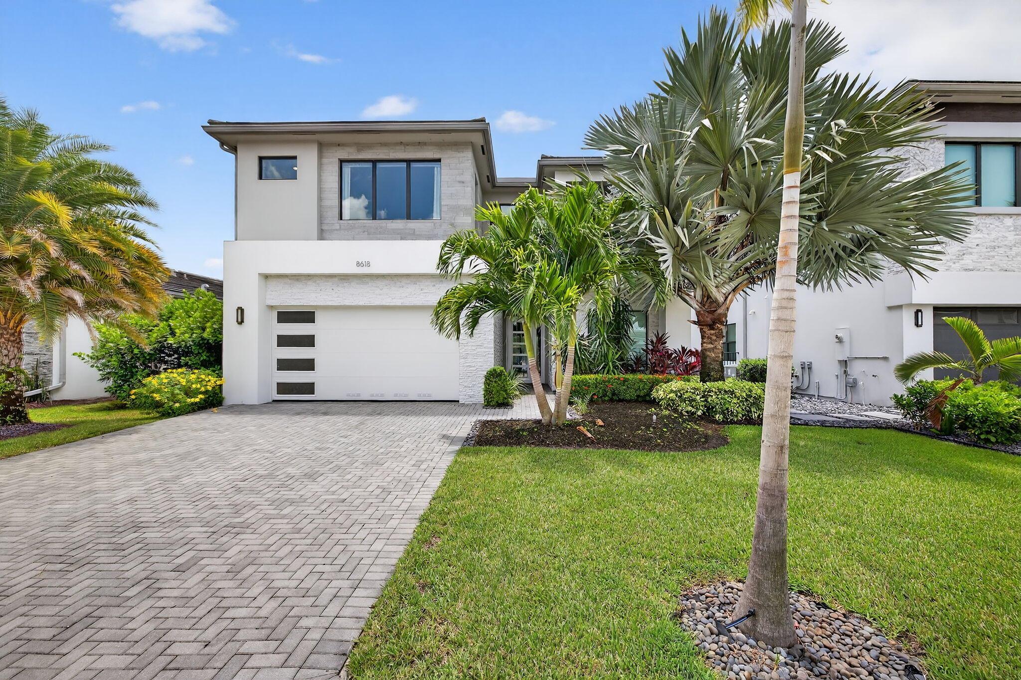 Resort-Style Living in a Prime Lakefront Mariana Model! Stunning 5BR/5BA home in an all-age gated community with luxury clubhouse, pickleball, tennis, fitness center, and resort pool. Completely upgraded with custom built-ins, fireplace, media room, and master suite with balcony. South-facing pool/spa, summer kitchen, updated landscaping, and full-house generator--all on a premier lake lot. Live like you're in a model home!