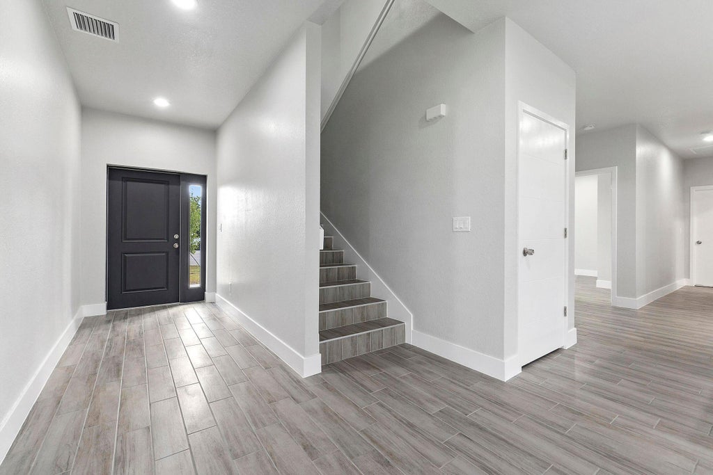 Photo of 1351 SW Don Court, Port Saint Lucie, FL 34953 (MLS # B26064906)