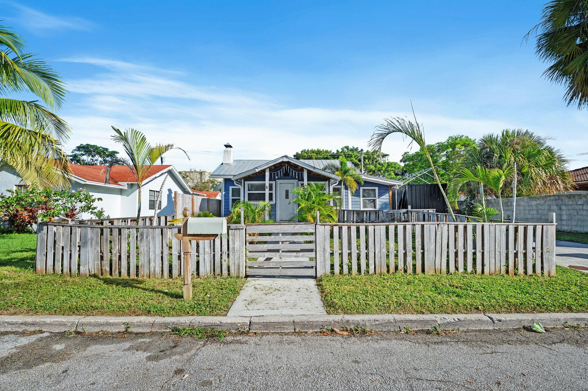 This charming 2-bedroom, 1-bath home and a 1 bedroom 1 bath guest house offers a cozy South Florida feel with 32x32 porcelain tile throughout, remodeled bathrooms, and a spacious kitchen featuring a 6-burner gas stove and stainless steel appliances. The home also includes a newer metal roof and upgraded plumbing for added peace of mind. The detached 1-bedroom, 1-bath guest unit (approx. 400 sq ft) generates $3,500–$4,000/month—perfect for Airbnb or rental income. Additional features include a gas stove, gas water heater, whole-home generator, and a washer/dryer. Ideally located near the Intracoastal and just minutes from the vibrant core of downtown West Palm Beach, surrounded by new restaurants, trendy boutiques, lively nightlife, and exciting new development.