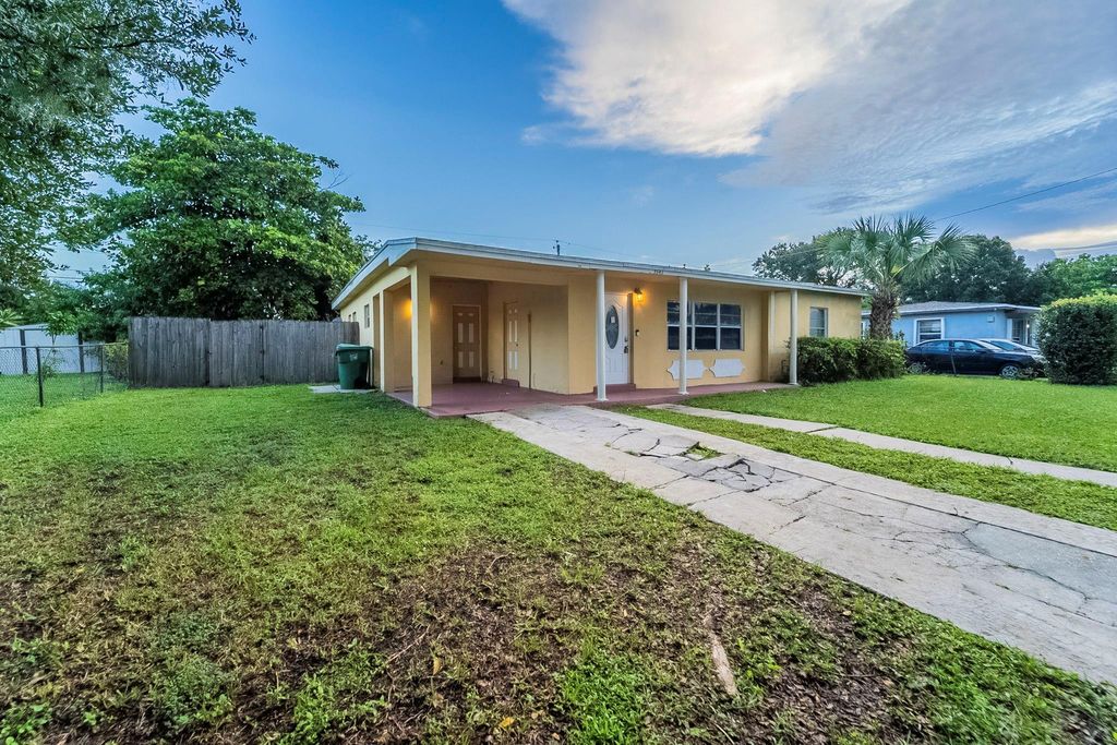 Photo of 3341 NW 7th St, Lauderhill, FL 33311 (MLS # F10529228)