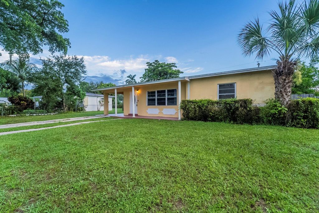Photo of 3341 NW 7th St, Lauderhill, FL 33311 (MLS # F10529228)