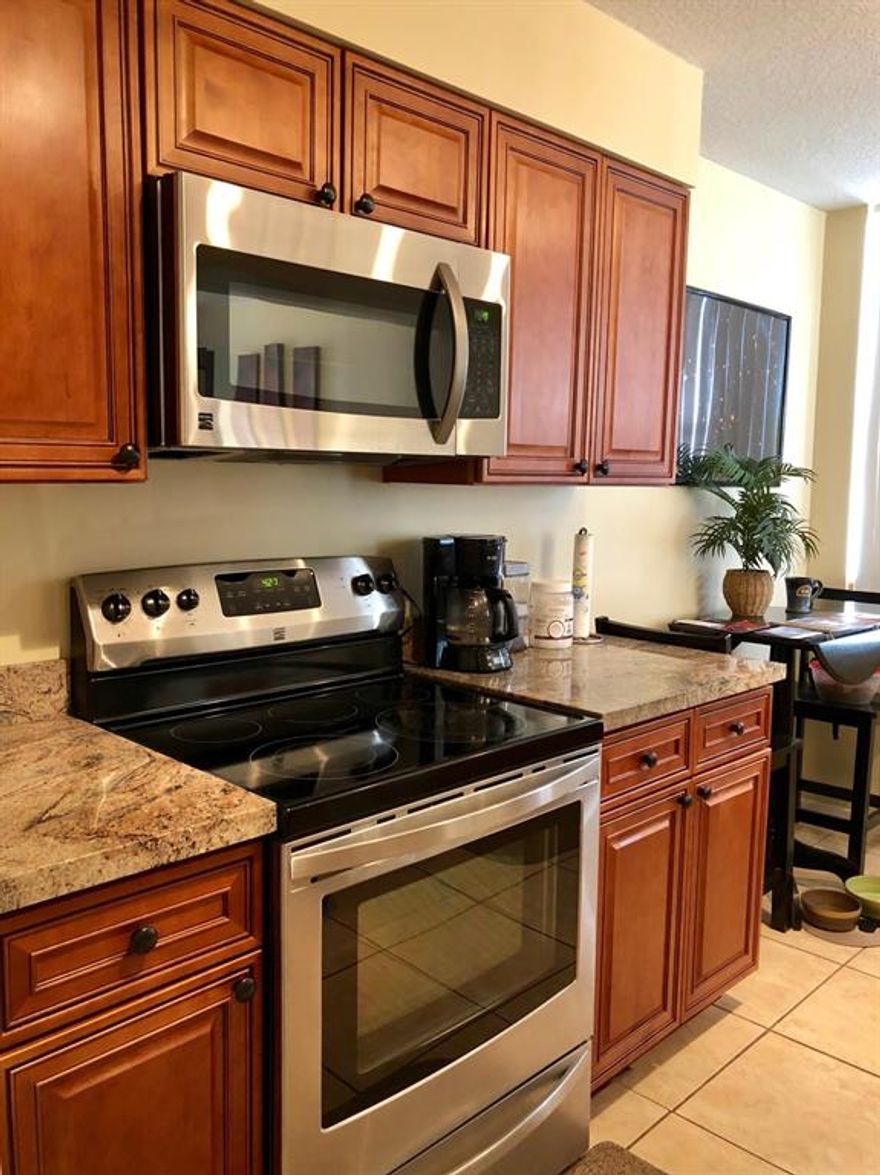 First floor 1 bedroom, 1 bath condo in the heart of Delray Beach. Updated kitchen and bath. Stainless steel appliances, full size washer & dryer. New A/C. Wrap around patio. Just steps away from the community pool. Close to the beach, shopping, restaurants, and more.All measurements are approximate.