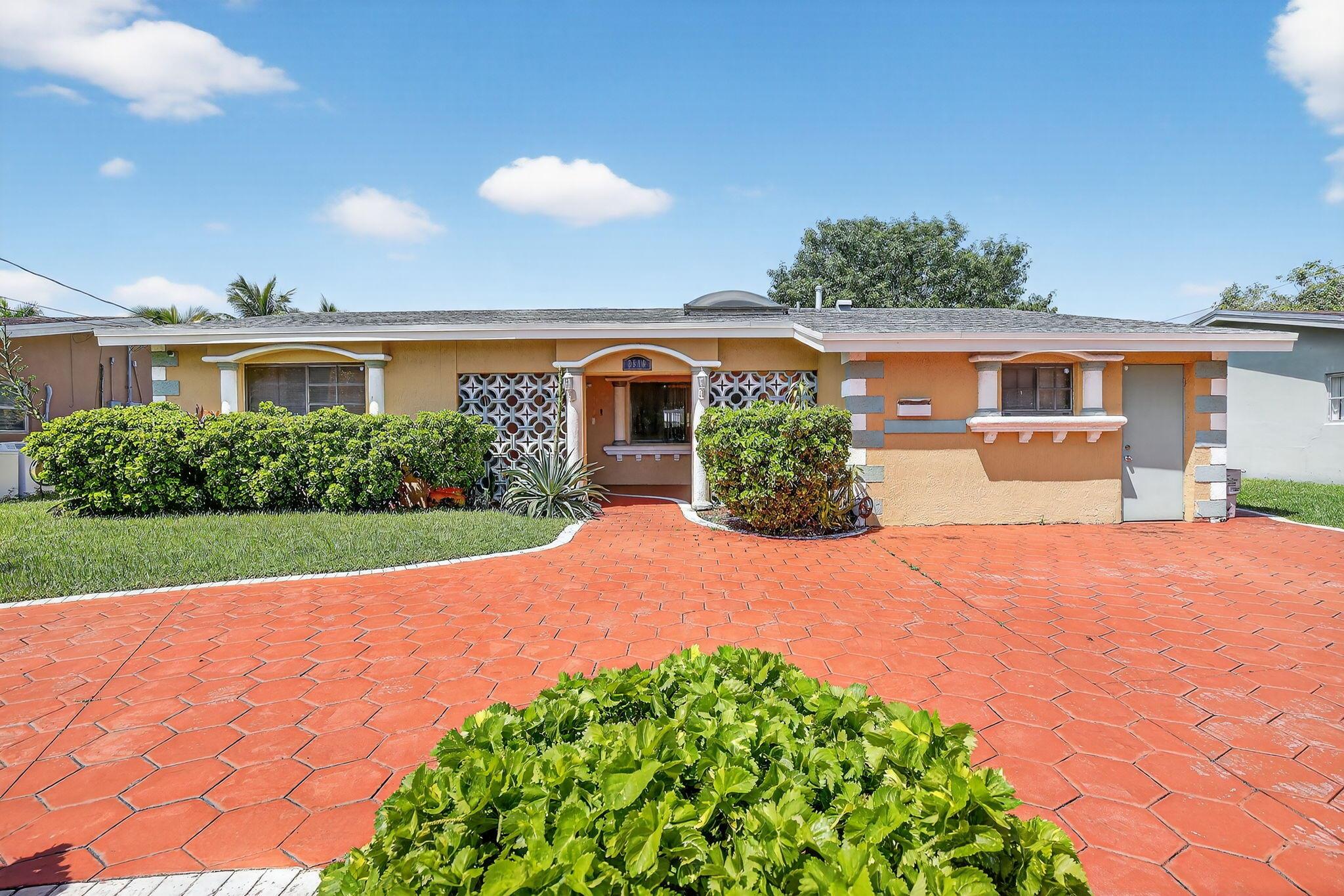 SELLER MOTIVATED! Stunning waterfront pool home in sought-after Miramar Isles with no HOA! This 4-bedroom, 2-bath home offers 65 feet of canal frontage with wide lake views, perfect for enjoying the Florida lifestyle. Major updates include a new roof (2019) and central A/C (2020). The upgraded kitchen features modern cabinets and stainless steel appliances. The converted garage serves as a 4th bedroom with private entry -- ideal for guests, in-law quarters, or a rental income opportunity. Spacious master with walk-in closet, tiled living areas, and a large screened patio with pool make this property perfect for entertaining. Conveniently located near shopping, dining, and major highways, this home combines lifestyle, comfort, and strong investment potential.