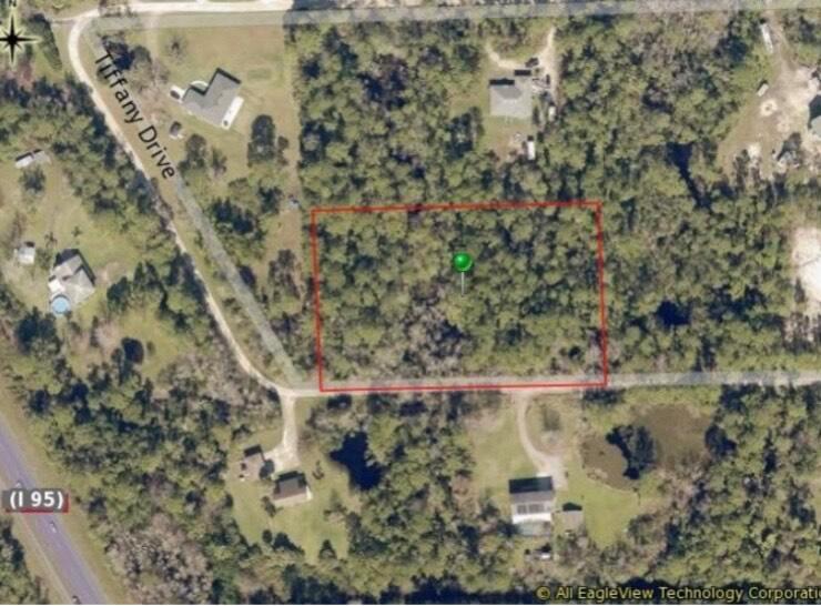 Owner will finance !!! Build or bring your dream home on this beautiful lot , do not miss this incredible opportunity to purchase 2.33 acres of prime land in the desirable of New Smyrna Beach , Florida . Close to the beautiful beaches and all amenities of the city , this land is a rare find in today's market .Don't wait , take the first step towards turning your dream into a Reality .Buyers to do their due diligence , buyers to verify all information.