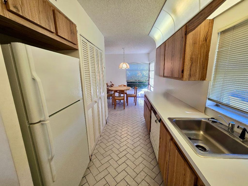 Photo of 13669 Date Palm Court #A, Delray Beach, FL 33484 (MLS # R11159849)