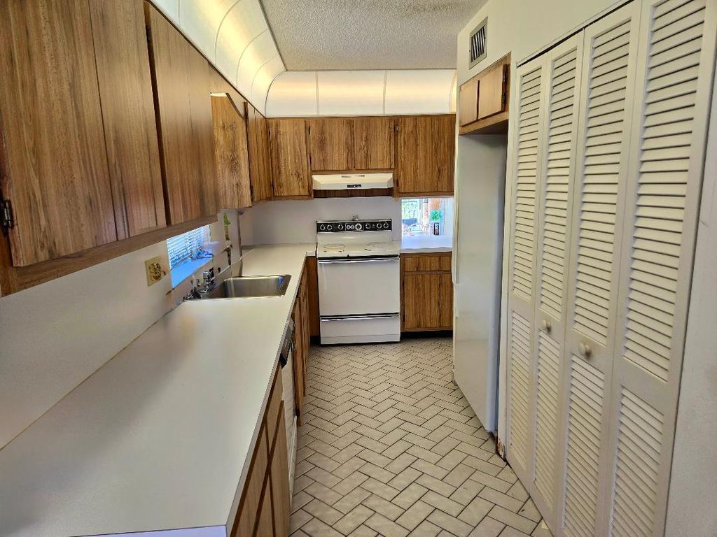 Photo of 13669 Date Palm Court #A, Delray Beach, FL 33484 (MLS # R11159849)