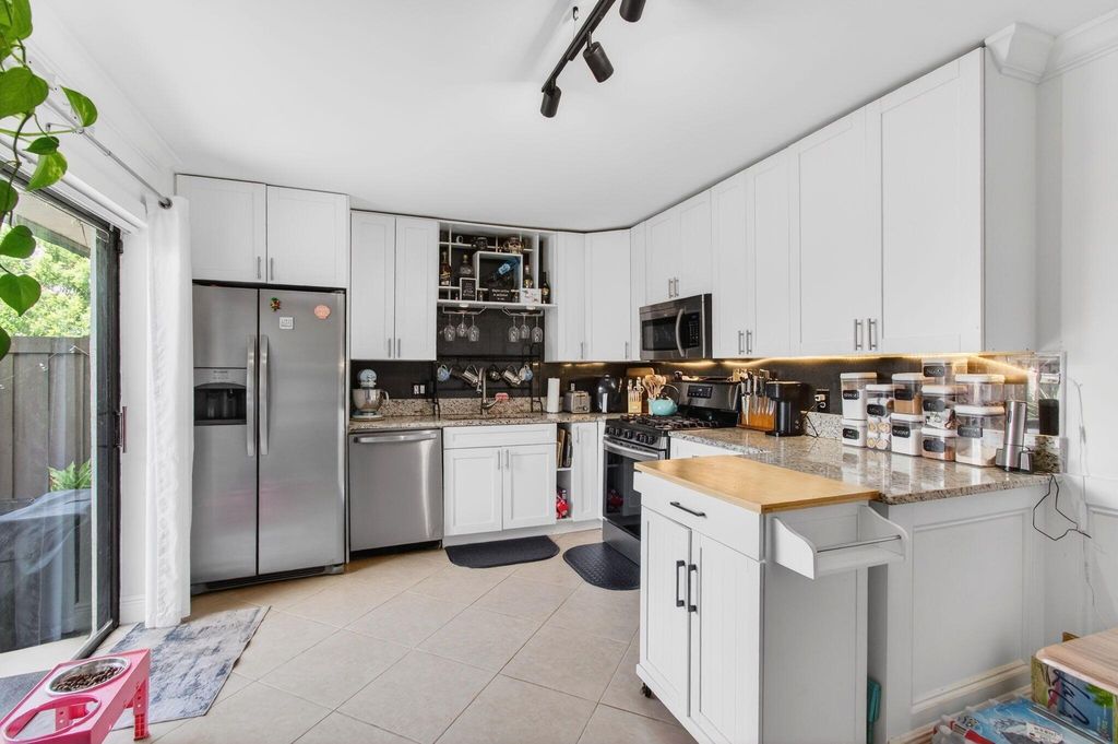 Photo of 2140 White Pine Circle #A, Greenacres, FL 33415 (MLS # R11144950)