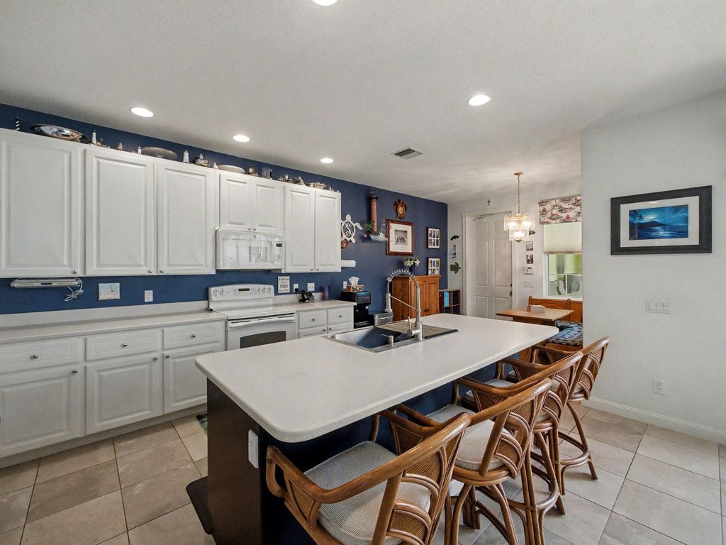 Photo of 110 Bonaire Lane, Jupiter, FL 33458 (MLS # B26008631)