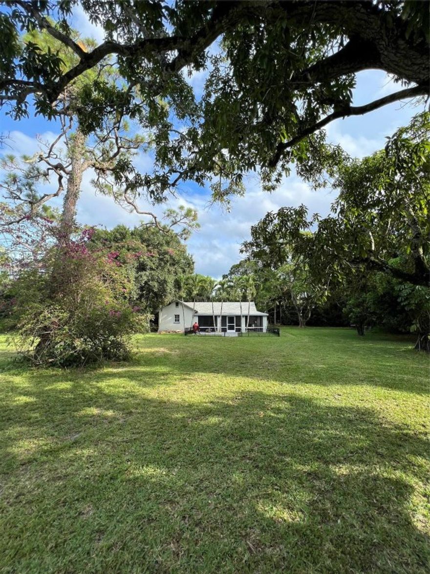 Exceptional 1.48-acre parcel in central Boynton Beach, within the Manor Forest community but exempt from HOA fees. Prime infill development opportunity—subdivision process underway with a reputable land planner, exploring potential for up to 8 single-family lots (buyer to verify). No final approvals or entitlements yet. Zoning RS, Future Land Use MR-5, utilities on site, and legal ingress/egress rights in place. Existing 2/1 cottage rented for $2,000/mo on month-to-month lease provides holding income while plans progress. Rare development site in a desirable in-town location. Exceptional 1.48-acre parcel in central Boynton Beach offering a rare infill development opportunity. Located within the Manor Forest community but exempt from HOA fees, the property combines privacy, location, and flexibility for builders or investors. A subdivision process is underway with a reputable land planner, exploring potential for up to 8 single-family lots (buyer to verify). No final approvals or entitlements have been granted at this time. Zoning is RS with Future Land Use designation MR-5, allowing up to five units per acre under current standards.The property features legal ingress/egress rights, mature trees, and city utilities already on site. An existing 2-bedroom, 1-bath cottage provides immediate rental income ($2,000/mo, month-to-month lease) while development planning continues.This is one of the few remaining large parcels in an established residential area of Boynton Beach. Excellent proximity to I-95, beaches, shopping, and schools. Full survey, concept plan, and land planner contact available upon request. Do not disturb tenant; appointment required for all showings.