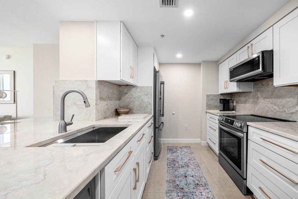 Photo of 625 Casa Loma Boulevard #1408, Boynton Beach, FL 33435 (MLS # B26044236)