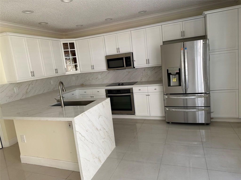 Photo of 16304 SW 48th Street #1, Miramar, FL 33027 (MLS # F10530668)