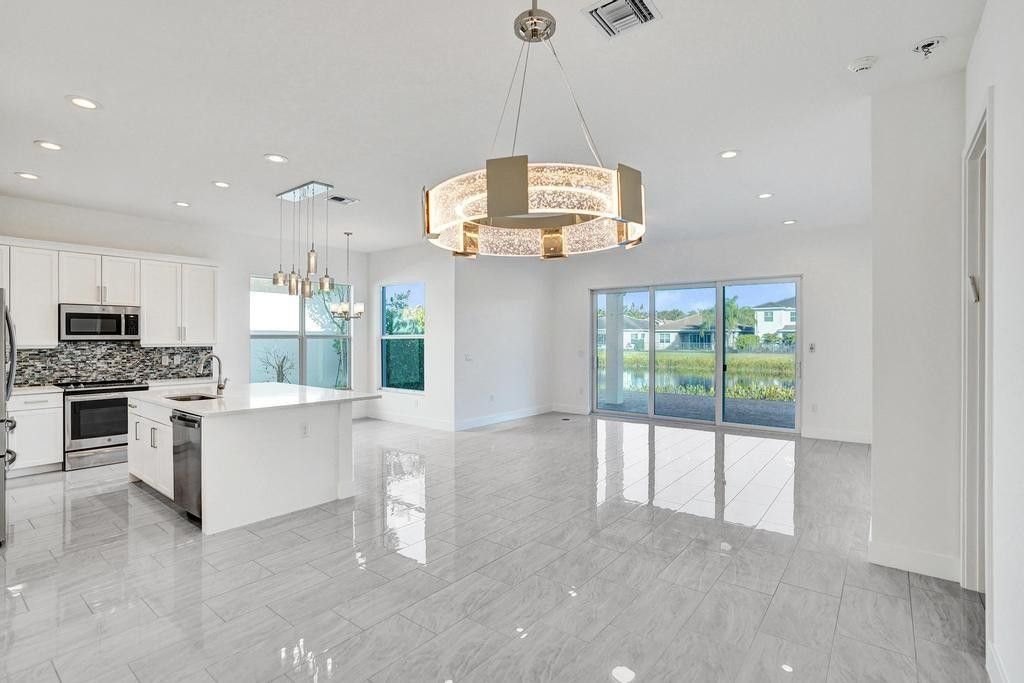 Photo of 9623 Brook Isles Avenue, Delray Beach, FL 33446 (MLS # F10537231)