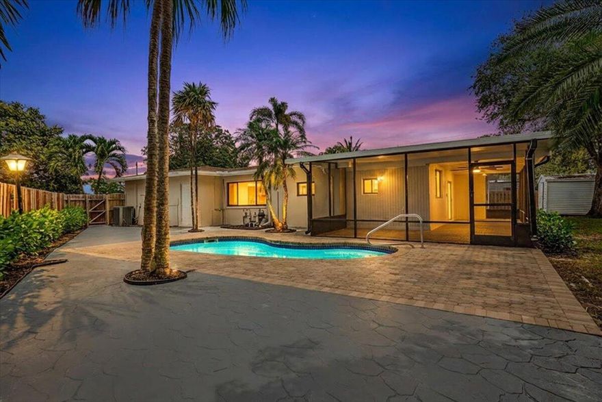 Exceptional home and investment opportunity in highly desirable Boulevard Heights. This spacious 3-bedroom, 3-bath home includes a large 1/1 suite—ideal for multigenerational living, guest quarters, or income potential. Easily adaptable to a true 4/3 layout with ample living space, a pool, and a 2-car garage. Situated on a massive, fully fenced lot, the property offers a wraparound screened porch, storage shed, pool, and plenty of room to create your ideal outdoor retreat. Recent updates include hurricane-impact windows and doors, durable, water-resistant vinyl flooring, a modern, open kitchen with an island, updated fixtures, fresh interior paint, and refreshed landscaping. NO HOA! A rare combination of space, flexibility, and value—don't miss this opportunity.