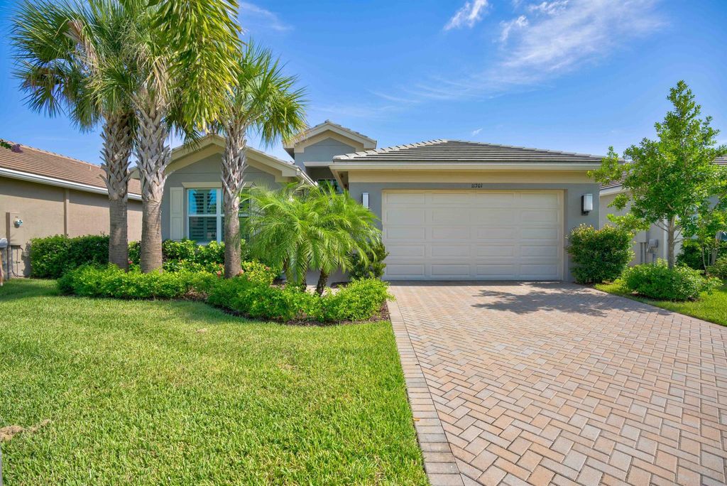 Photo of 11701 SW Sailfish Isles Way, Port St Lucie, FL 34987 (MLS # R10906438)