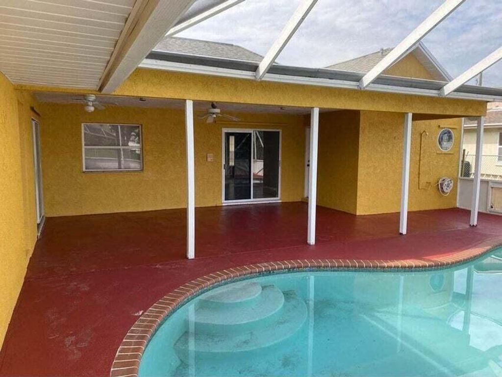 Photo of 2767 SE Rawlings Road, Port Saint Lucie, FL 34952 (MLS # R11055891)