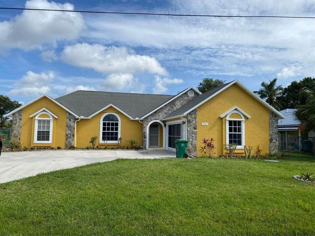 Photo of 2767 SE Rawlings Road, Port Saint Lucie, FL 34952 (MLS # R11055891)