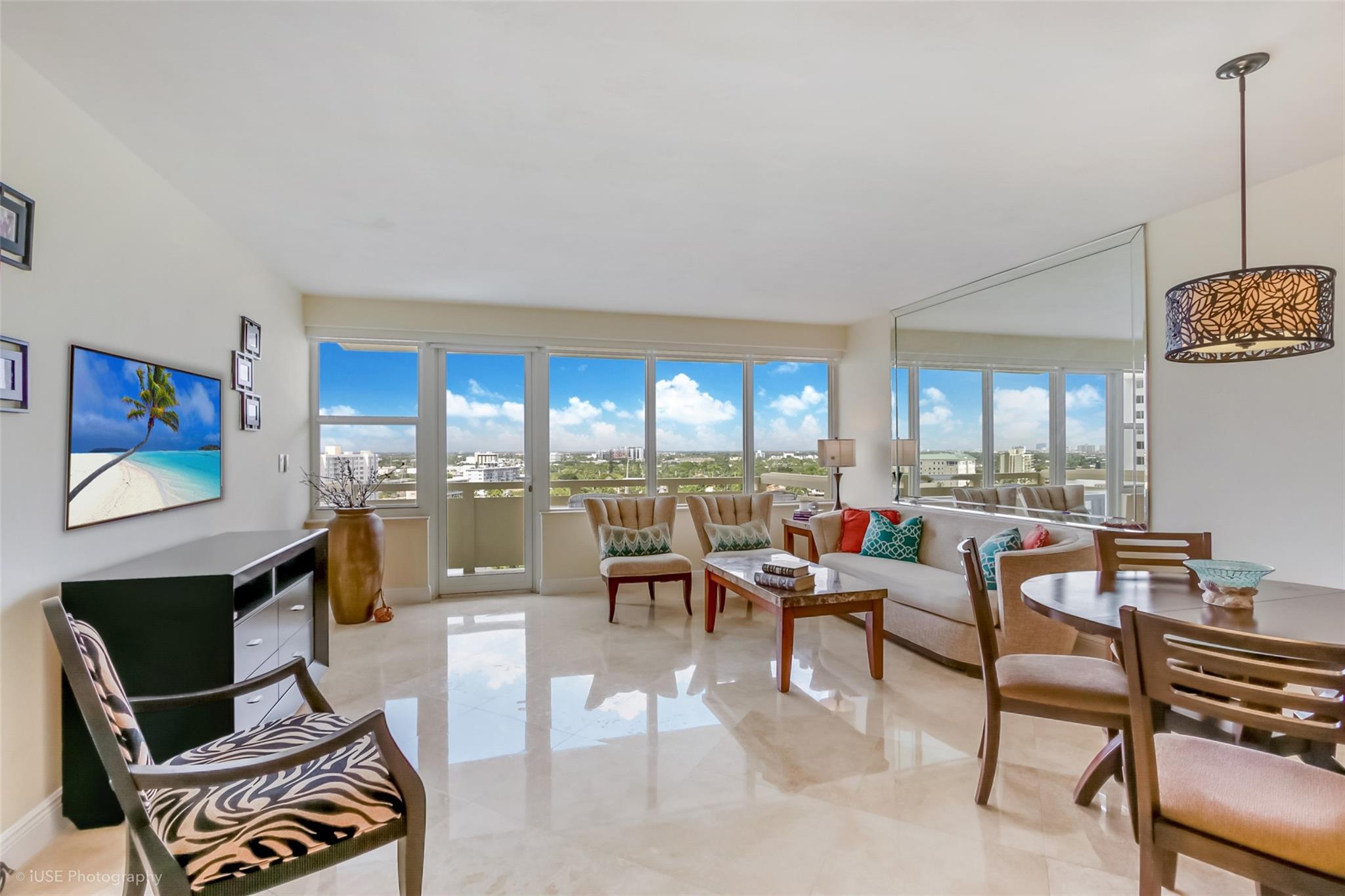 Price Improvement! Priced to sell! Enjoy breathtaking sunset and intracoastal views from this beautifully designed 2 bedroom /2 bathroom co-op. This preferred west facing unit is filled with natural light with stunning water views from all living /bedroom areas. It has been meticulously maintained with recently refinished travertine floors, custom motorized shades and ample cabinet /closet storage. Renovated open-concept kitchen and living area are perfect for entertaining, upgraded stainless steel appliances, including new refrigerator and water heater. Location is perfectly situated, walking distance to vibrant restaurants, shopping and the beach. Building amenities include waterfront pool, fitness room, shuffleboard, car wash area and more. Professional management and 24/7 security