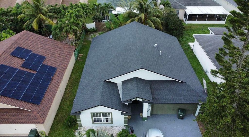 Photo of 1029 Cape Cod Terrace, Greenacres, FL 33413 (MLS # R11167774)