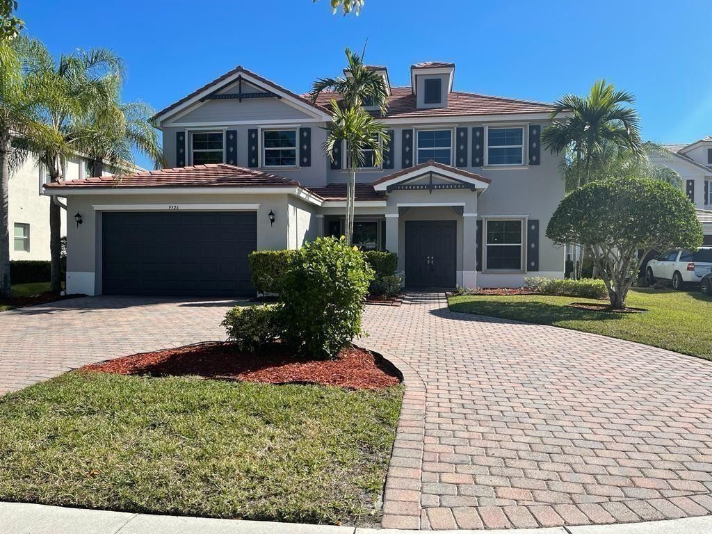 Photo of 9326 Plantation Estates Drive, Royal Palm Beach, FL 33411 (MLS # F10545544)
