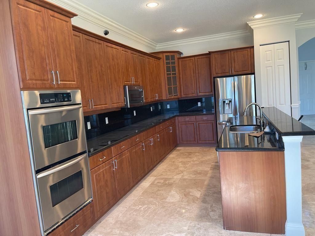 Photo of 9326 Plantation Estates Drive, Royal Palm Beach, FL 33411 (MLS # F10545544)