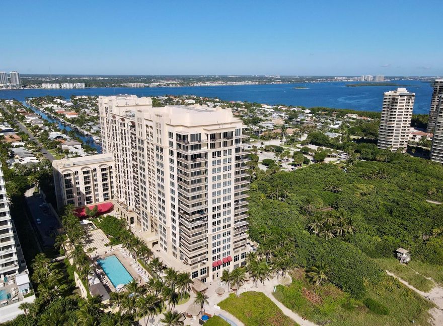 Experience the ultimate in coastal living with this spectacular oceanfront condo located within the prestigious Palm Beach Marriott Singer Island. This expansive 3-bedroom, 3.5-bathroom residence offers unobstructed panoramic views of both the Atlantic Ocean and the Intracoastal Waterway.You will see sunrises and sunsets like you've never seen before. Step inside to find a modern open  concept layout with designer finishes throughout. The gourmet kitchen is a chef's dream, featuring top of the line Viking appliances, a professional grade gas stove, custom cabinetry, and sleek stone countertops perfect for entertaining or enjoying a quiet meal with a view. Each bedroom is its own private retreat, with ensuite bathrooms, generous