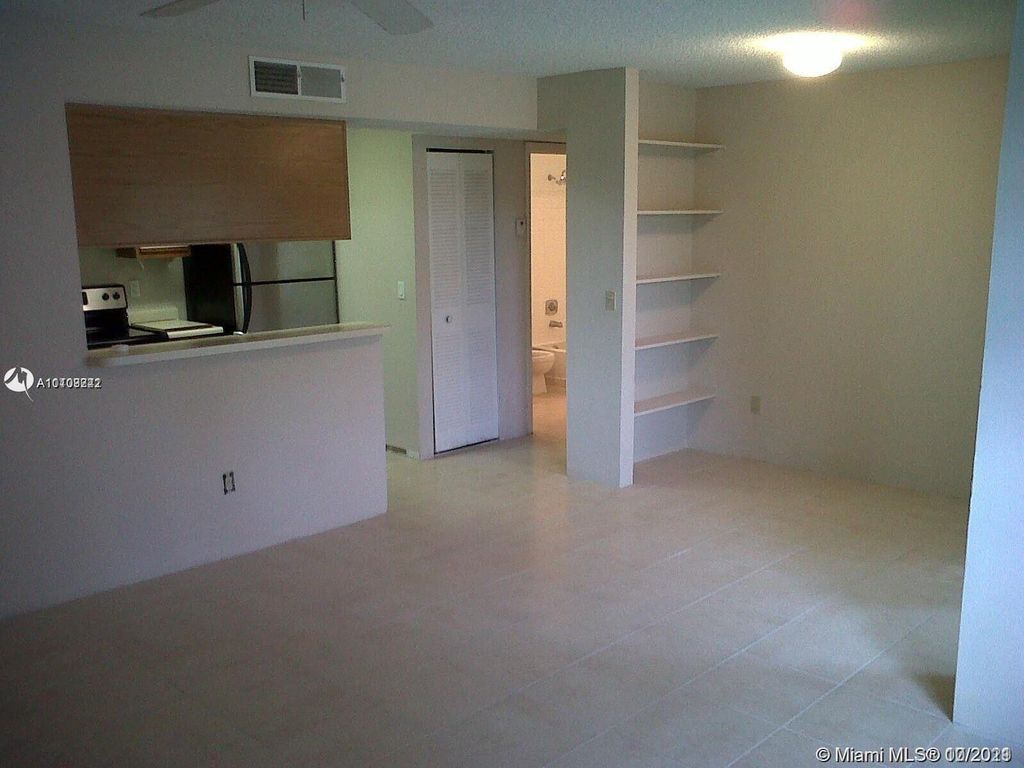 Photo of 1239 SW 46th Avenue #906, Pompano Beach, FL 33069 (MLS # R11143787)