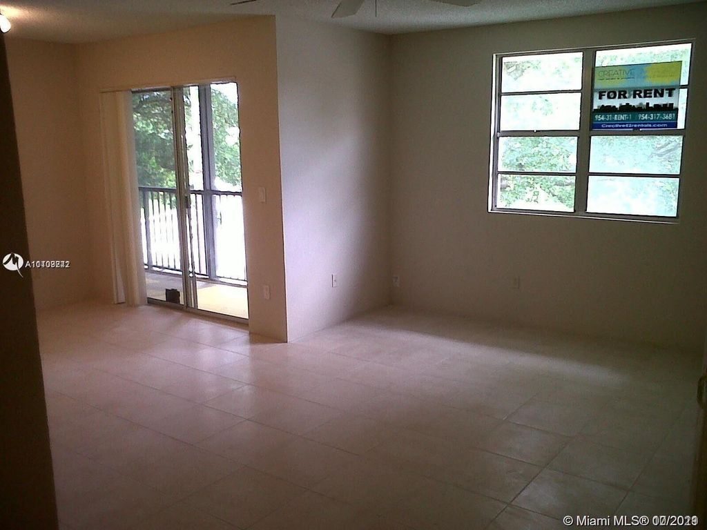 Photo of 1239 SW 46th Avenue #906, Pompano Beach, FL 33069 (MLS # R11143787)