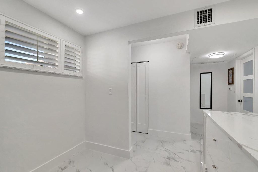 Photo of 2616 N Garden 107 Drive N #107, Lake Worth, FL 33461 (MLS # R11093383)