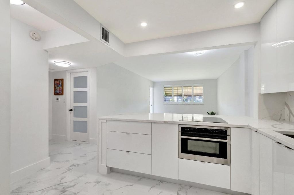 Photo of 2616 N Garden 107 Drive N #107, Lake Worth, FL 33461 (MLS # R11093383)