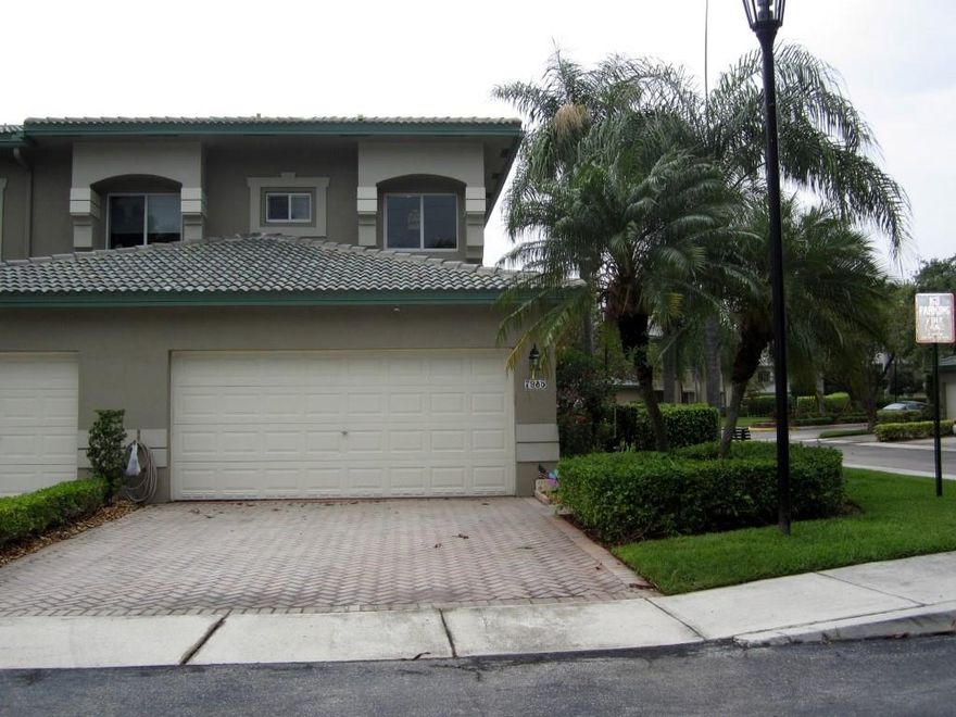 *Location, Location, 3/2/family room/ coach home w/2 car garage & private interior elevator**tile all rooms except M.B. Carpet*2 bedrooms laminate*separate laundry room w/brand new washer/dryer** newer a/c,& refrigerator & stove*HURRICANE impact windows**brand new garage door system*Lorex 4 channel surveillance  system *(camera) included**Acrylic sliders & accordion shutters w/sunscreen shades on screened patio**beautiful flowering bottle brush tree in back*2 SMALL PETS OK*Deed paid*walk to pool & mailbox*