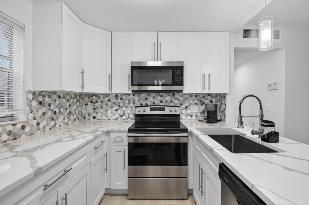 Photo of 352 Brittany H, Delray Beach, FL 33446 (MLS # B26069058)