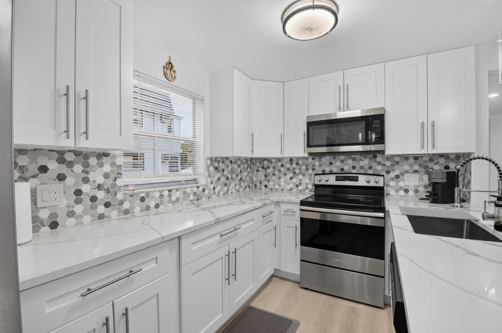Photo of 352 Brittany H, Delray Beach, FL 33446 (MLS # B26069058)