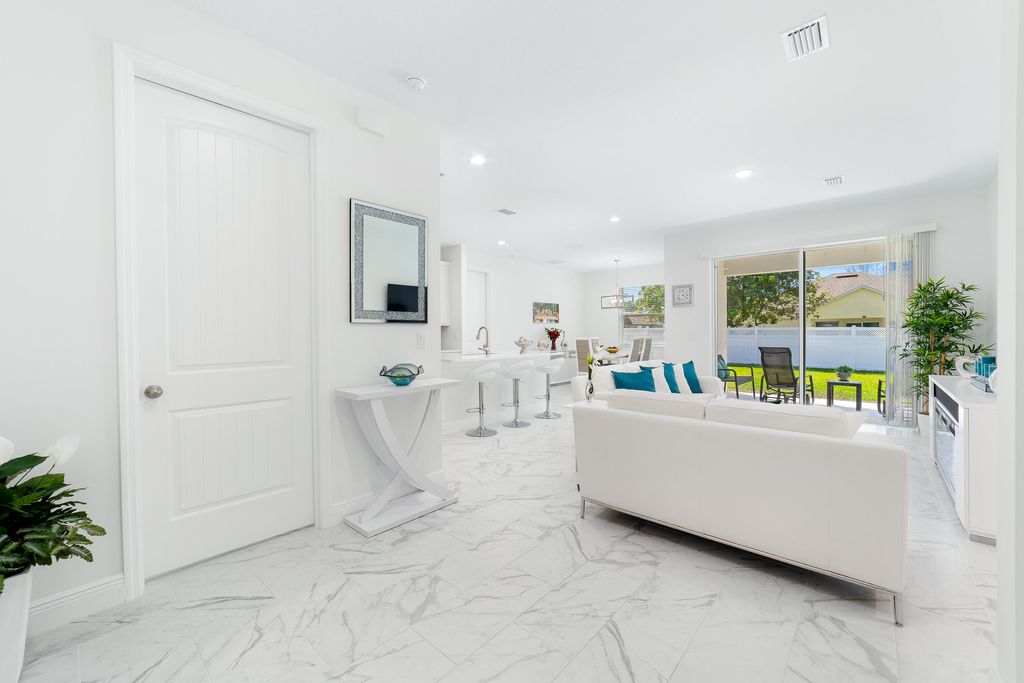 Photo of 3682 SW Margela Street, Port Saint Lucie, FL 34953 (MLS # R11064193)