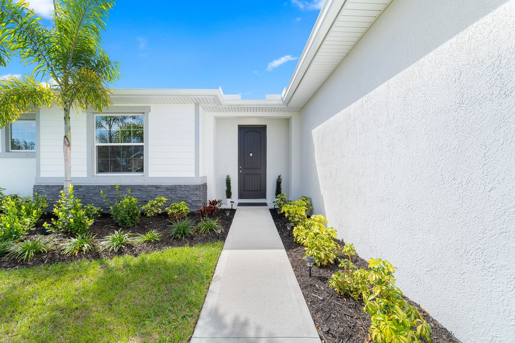 Photo of 3682 SW Margela Street, Port Saint Lucie, FL 34953 (MLS # R11064193)