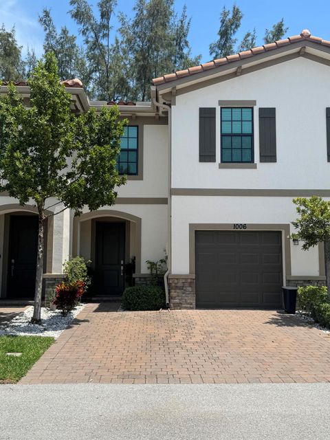 Photo of 1006 Sweet Briar Lane, Riviera Beach, FL 33410 (MLS # R11107257)